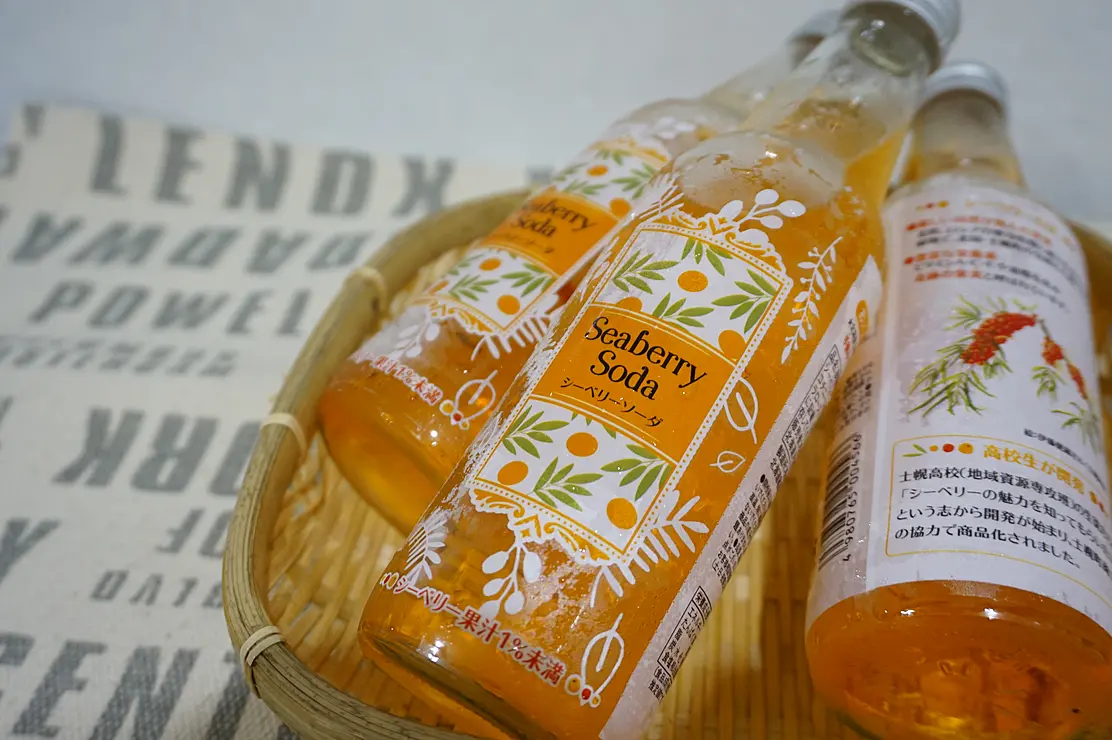 瓶に入ったオレンジのソーダ